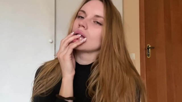 Pretty girl licking her..