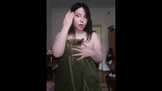 A brunette woman excitedly..