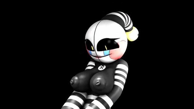 Marionette shakes her tits..