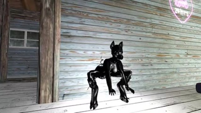 Rubber girl masturbates with..