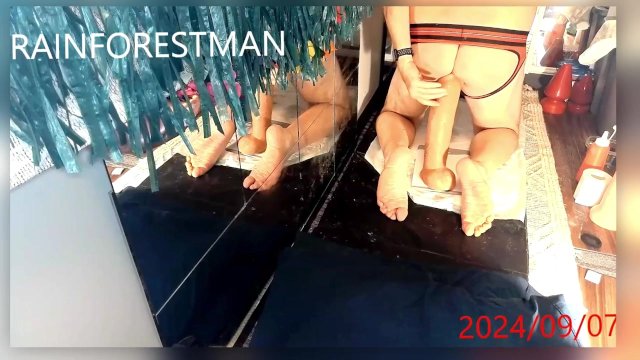 Rainforest-man Feeding his..